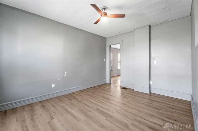 578 Wyoming St, Dayton, OH 45410 - unfurnished room with light wood-style flooring, ceiling fan, and baseboards