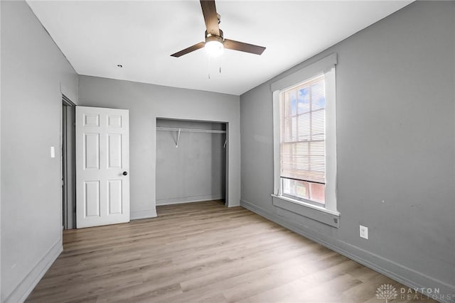 578 Wyoming St, Dayton, OH 45410 - unfurnished bedroom featuring a closet, baseboards, and wood finished floors
