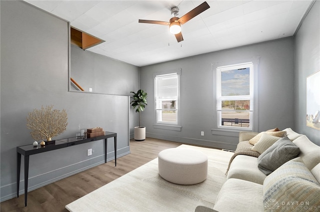 578 Wyoming St, Dayton, OH 45410 - living room with baseboards, a ceiling fan, and wood finished floors
