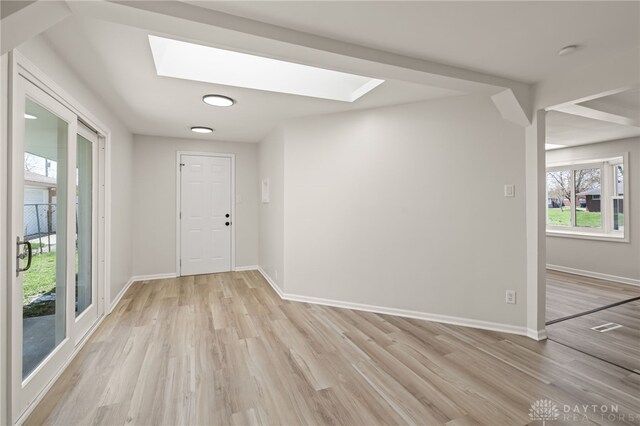 4433 Lambeth Dr, Dayton, OH 45424 - interior space with a skylight, baseboards, and light wood finished floors