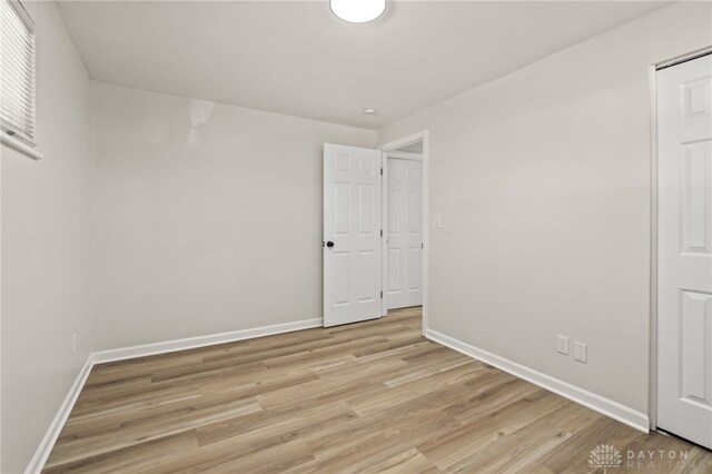 4433 Lambeth Dr, Dayton, OH 45424 - unfurnished room featuring baseboards and light wood-type flooring