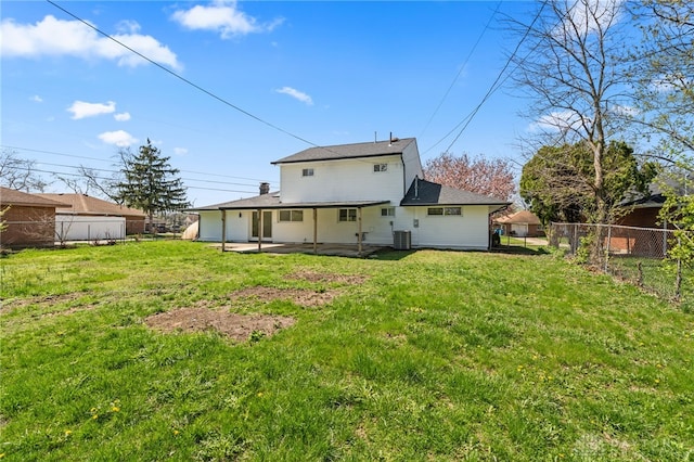 4433 Lambeth Dr, Dayton, OH 45424 - rear view of house featuring a lawn, a patio area, fence, and cooling unit