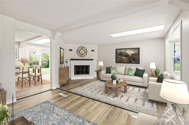 4433 Lambeth Dr, Dayton, OH 45424 - living room featuring visible vents, a brick fireplace, wood finished floors, baseboards, and a skylight