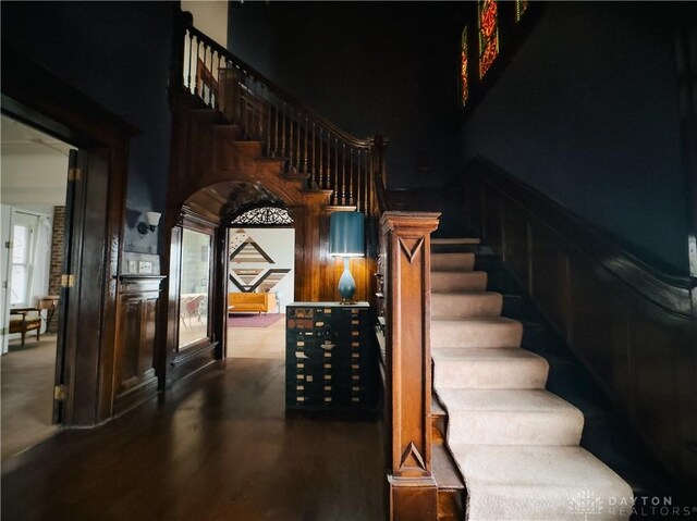1400 E 3rd St, Dayton, OH 45403 - stairs with wood finished floors and a towering ceiling