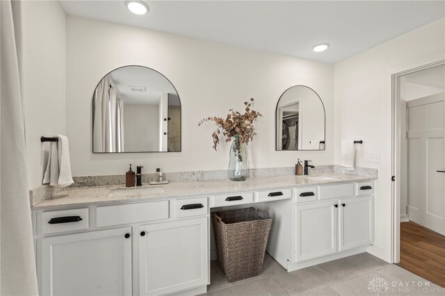 2164 Northbridge Trl, Troy, OH 45373 - bathroom featuring double vanity, tile patterned flooring, and recessed lighting