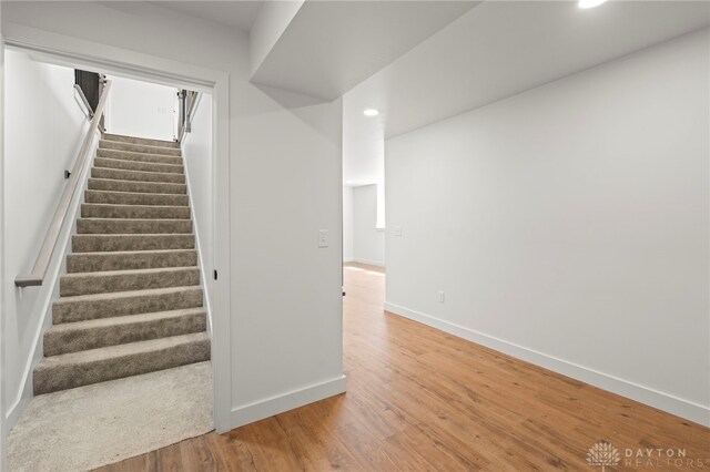 2164 Northbridge Trl, Troy, OH 45373 - stairs with recessed lighting, baseboards, and wood finished floors