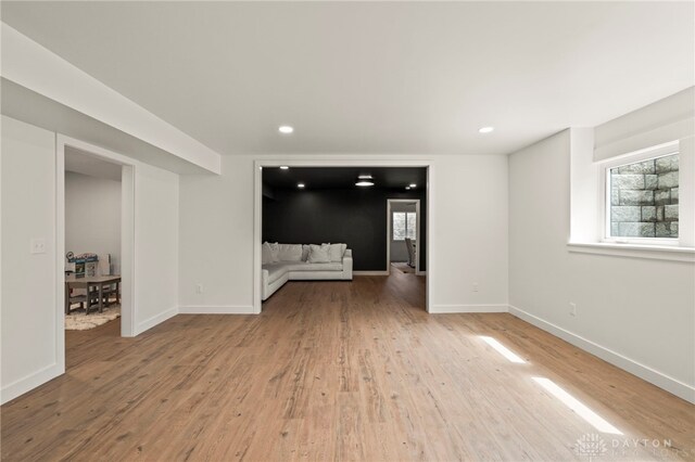 2164 Northbridge Trl, Troy, OH 45373 - unfurnished living room with plenty of natural light, wood finished floors, baseboards, and recessed lighting