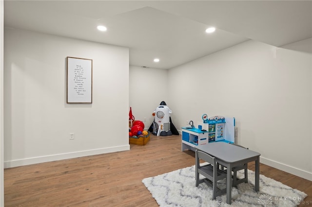 2164 Northbridge Trl, Troy, OH 45373 - playroom with wood finished floors, baseboards, and recessed lighting