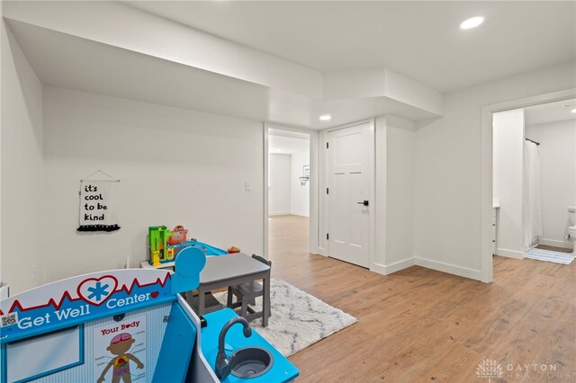 2164 Northbridge Trl, Troy, OH 45373 - playroom featuring light wood finished floors, recessed lighting, and baseboards