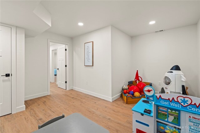 2164 Northbridge Trl, Troy, OH 45373 - playroom with baseboards, wood finished floors, and recessed lighting