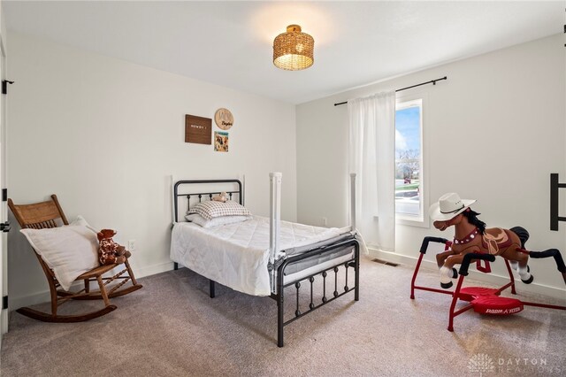 2164 Northbridge Trl, Troy, OH 45373 - carpeted bedroom featuring baseboards
