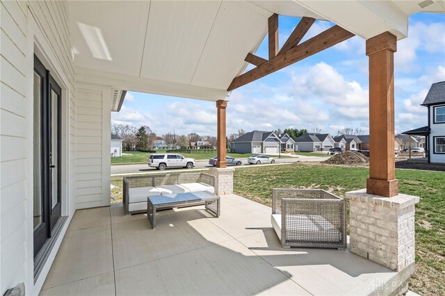 2164 Northbridge Trl, Troy, OH 45373 - view of patio with a porch and a residential view
