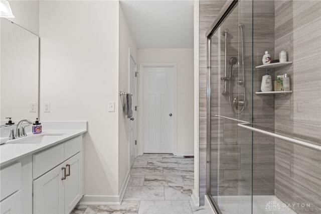 3059 Canvasback Ct, Franklin Twp, OH 45005 - bathroom featuring a shower stall, vanity, and marble finish floor