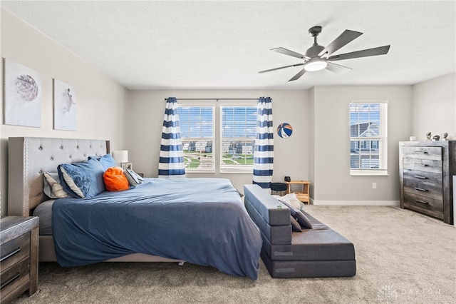 3059 Canvasback Ct, Franklin Twp, OH 45005 - bedroom with a ceiling fan, baseboards, multiple windows, and carpet