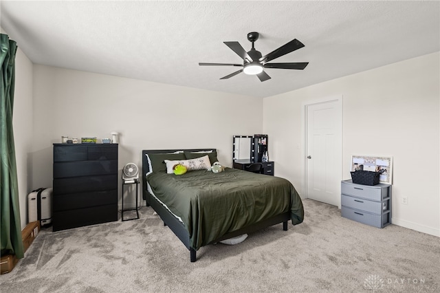 3059 Canvasback Ct, Franklin Twp, OH 45005 - carpeted bedroom featuring a textured ceiling, baseboards, and a ceiling fan