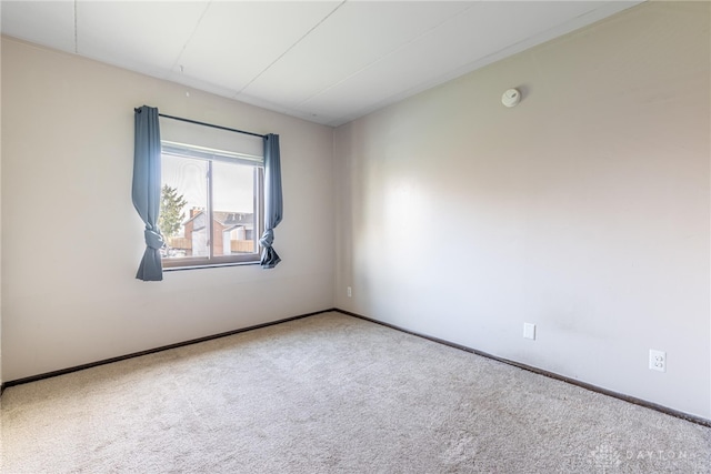 1739 Running Brook Trl Unit F, West Carrollton, OH 45449 - unfurnished room with carpet flooring, a smoke detector, and baseboards
