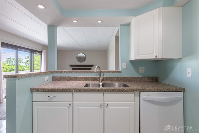 1739 Running Brook Trl Unit F, West Carrollton, OH 45449 - kitchen featuring white dishwasher, a sink, white cabinets, recessed lighting, and dark countertops