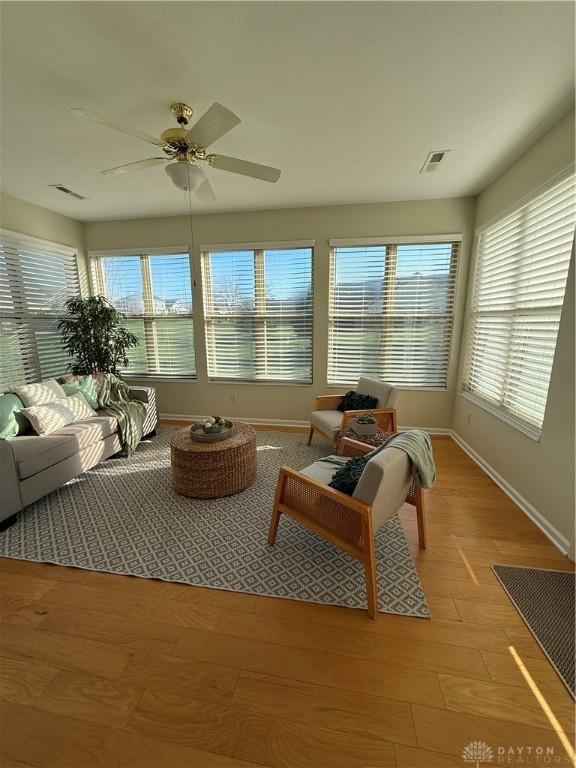 sunroom with visible vents and plenty of natural light