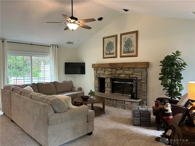living area with lofted ceiling, a fireplace, a ceiling fan, and carpet floors