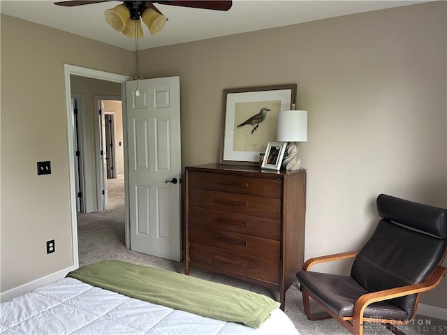 bedroom featuring carpet, baseboards, and ceiling fan