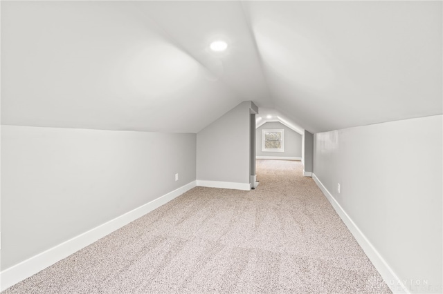 1109 N 11th St, Miamisburg, OH 45342 - bonus room featuring lofted ceiling, carpet floors, baseboards, and recessed lighting