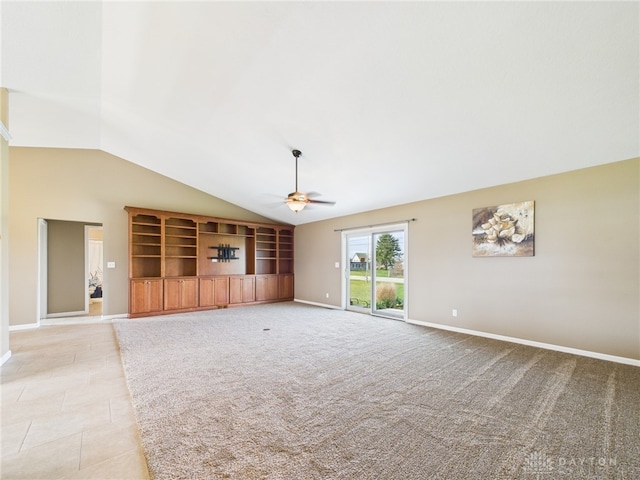 unfurnished living room featuring baseboards, vaulted ceiling, light carpet, light tile patterned floors, and a ceiling fan