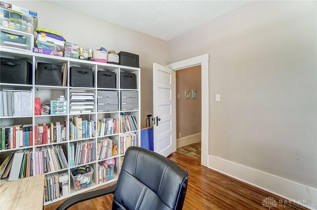 357 High St, Wilmington, OH 45177 - sitting room with wood finished floors and baseboards