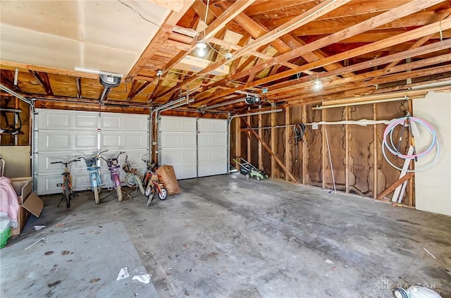357 High St, Wilmington, OH 45177 - garage featuring a garage door opener
