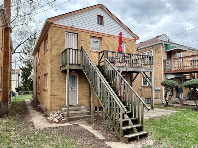 1029 Cumberland Ave, Dayton, OH 45406 - back of property featuring brick siding and entry steps