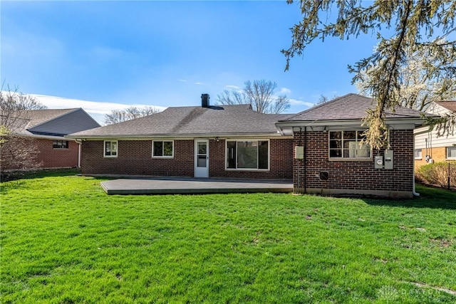645 Brookfield Rd, Dayton, OH 45429 - back of house with brick siding, a lawn, a deck, and a shingled roof