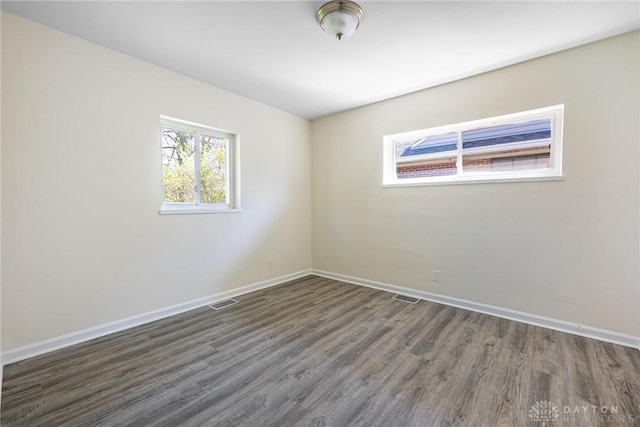 645 Brookfield Rd, Dayton, OH 45429 - unfurnished room with wood finished floors and baseboards