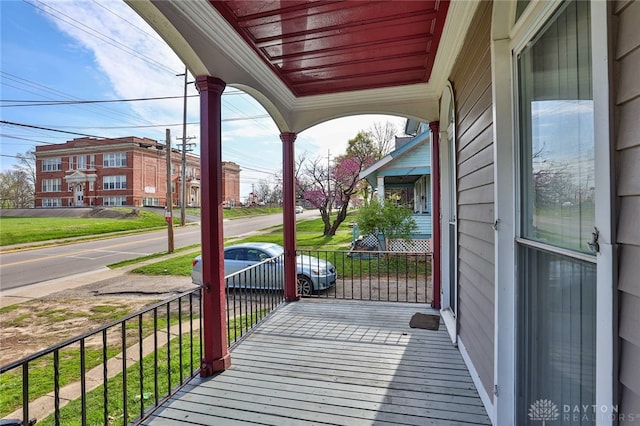 wooden terrace featuring a porch