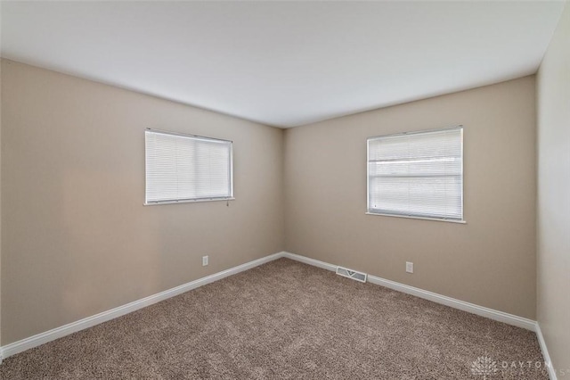 721 Trafalgar Ct, Middletown, OH 45044 - carpeted spare room featuring baseboards