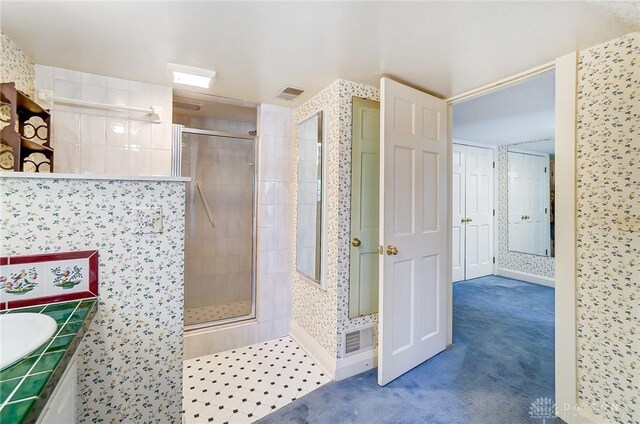 4600 Brown Rd, Sugarcreek Township, OH 45440 - bathroom featuring a shower stall and a sink