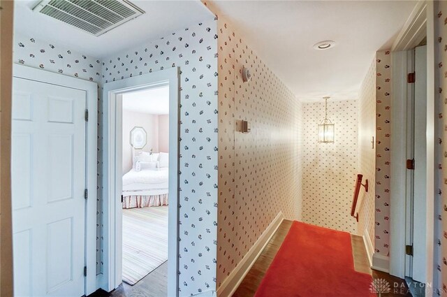 4600 Brown Rd, Sugarcreek Township, OH 45440 - hallway with wallpapered walls