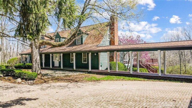 4600 Brown Rd, Sugarcreek Township, OH 45440 - view of front of home featuring a chimney and a porch