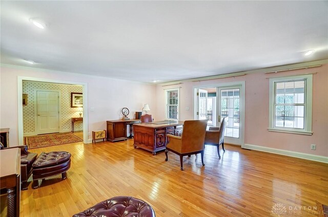 4600 Brown Rd, Sugarcreek Township, OH 45440 - living area with crown molding, light wood finished floors, and baseboards