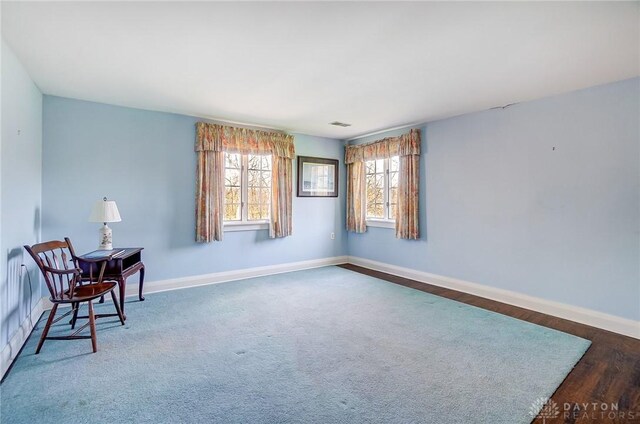 4600 Brown Rd, Sugarcreek Township, OH 45440 - unfurnished room with baseboards and wood finished floors