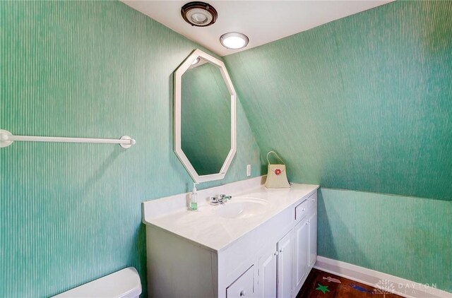 4600 Brown Rd, Sugarcreek Township, OH 45440 - half bathroom featuring vanity and toilet