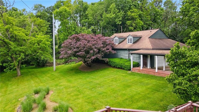 4600 Brown Rd, Sugarcreek Township, OH 45440 - view of front of home with a front yard