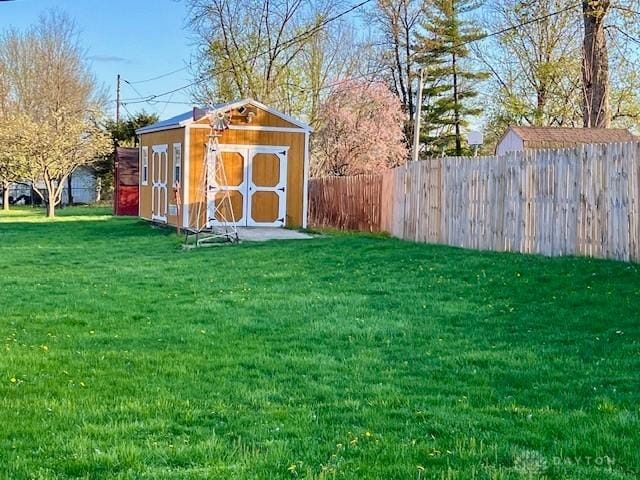 view of shed with fence