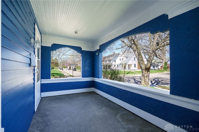 exterior space with a residential view and covered porch