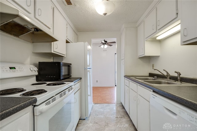 kitchen featuring ceiling fan, white appliances, white cabinetry, under cabinet range hood, and a sink