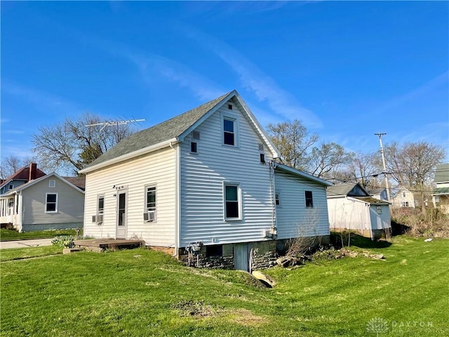 127 S Main St, Lewisburg, OH 45338 - view of property exterior with a yard and cooling unit