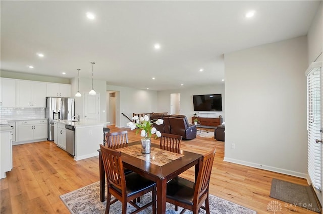 1110 Billingsley Dr, Batavia, OH 45103 - dining room with light wood-type flooring, baseboards, and recessed lighting