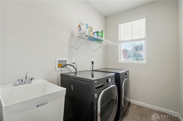 1110 Billingsley Dr, Batavia, OH 45103 - laundry room featuring laundry area, independent washer and dryer, wood finished floors, a sink, and baseboards