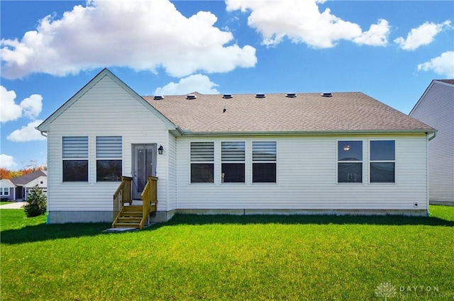 1110 Billingsley Dr, Batavia, OH 45103 - back of property featuring roof with shingles and a yard