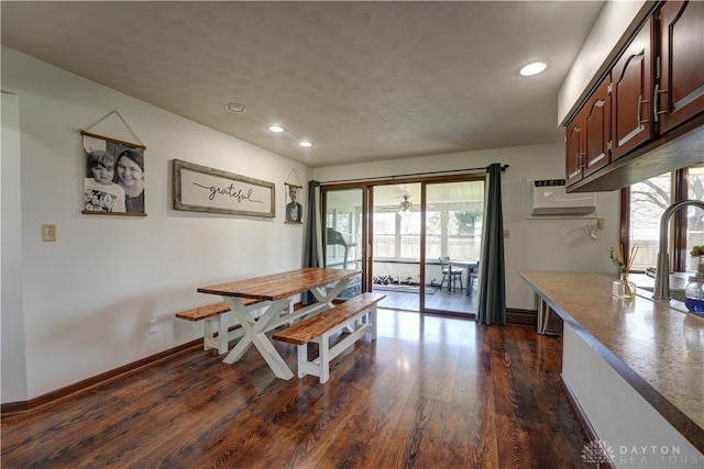 dining area with baseboards, recessed lighting, and dark wood-style floors