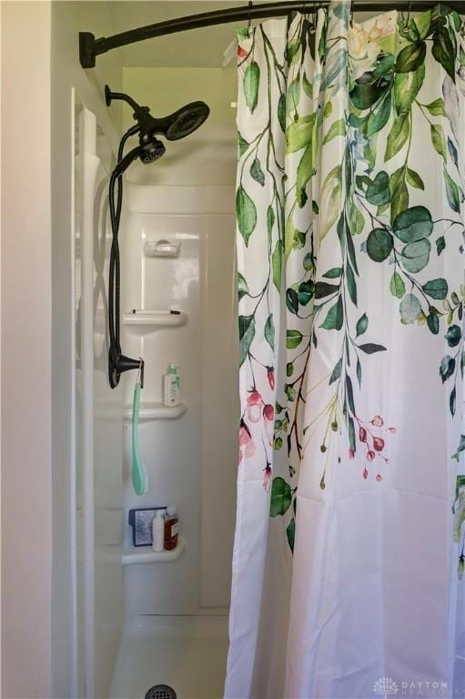 bathroom featuring a stall shower