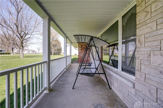 view of patio featuring a porch